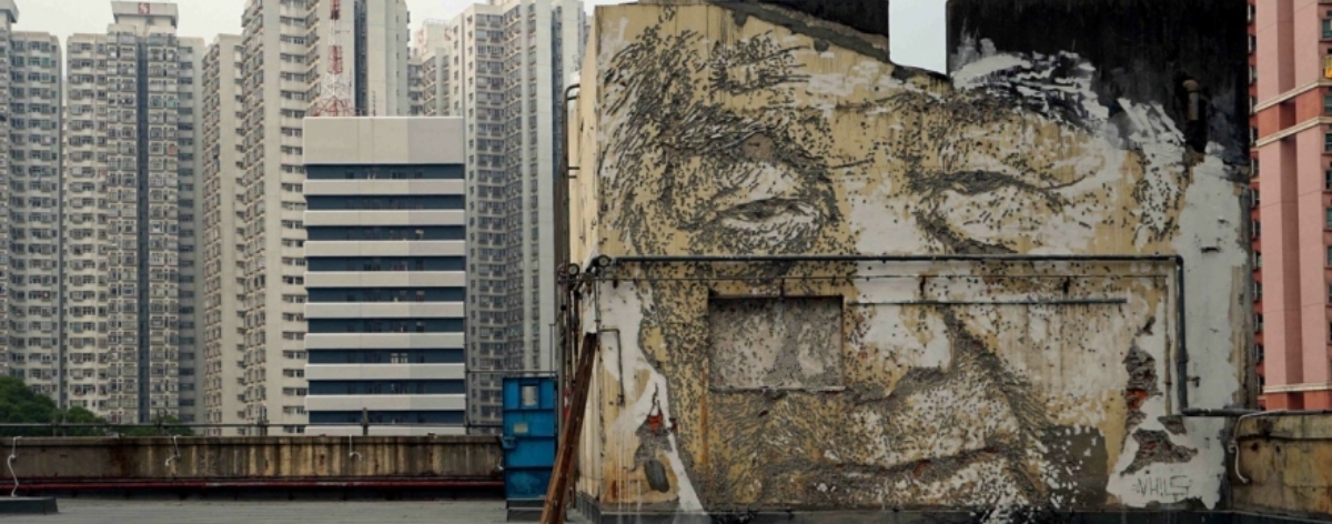 Piece created by Vhils in Hong Kong