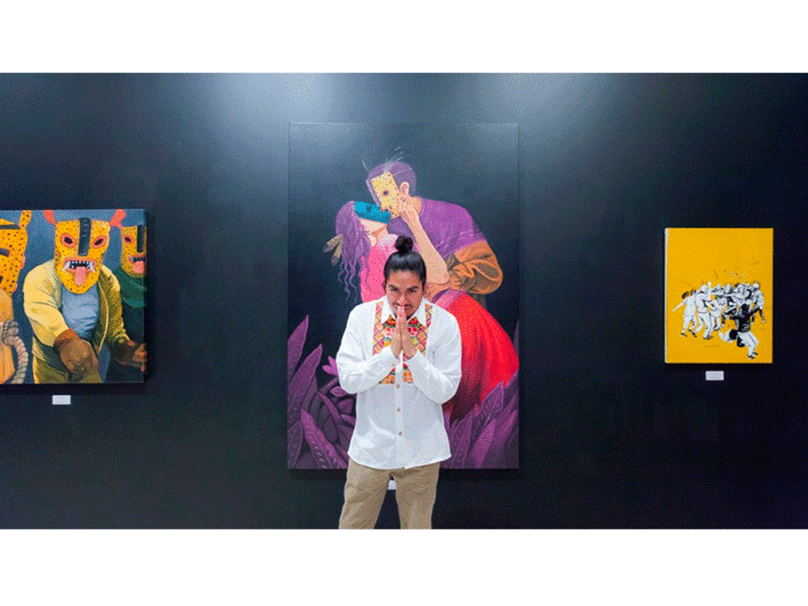 Saner in front of his artworks
