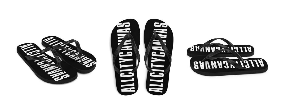 black flip flops with white typography