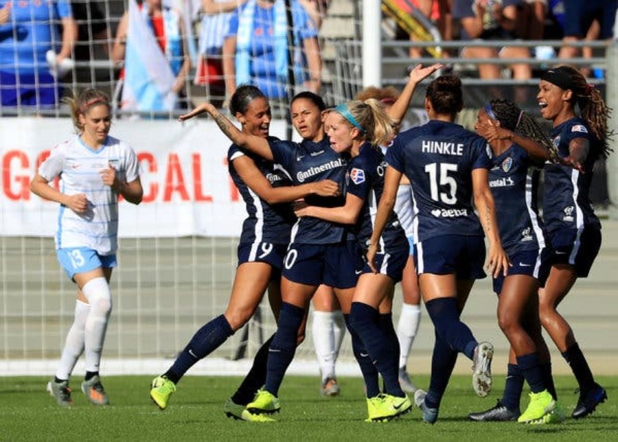 Debinha of the North Carolina Courage, pictured with her arms out, celebrated a goal with her teammates on Sunday in the N.W.S.L. title game.Credit...